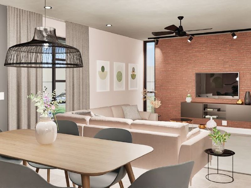 Modern open-plan living and dining area featuring a striking exposed brick feature wall, recessed lighting, and large windows providing ample natural light.