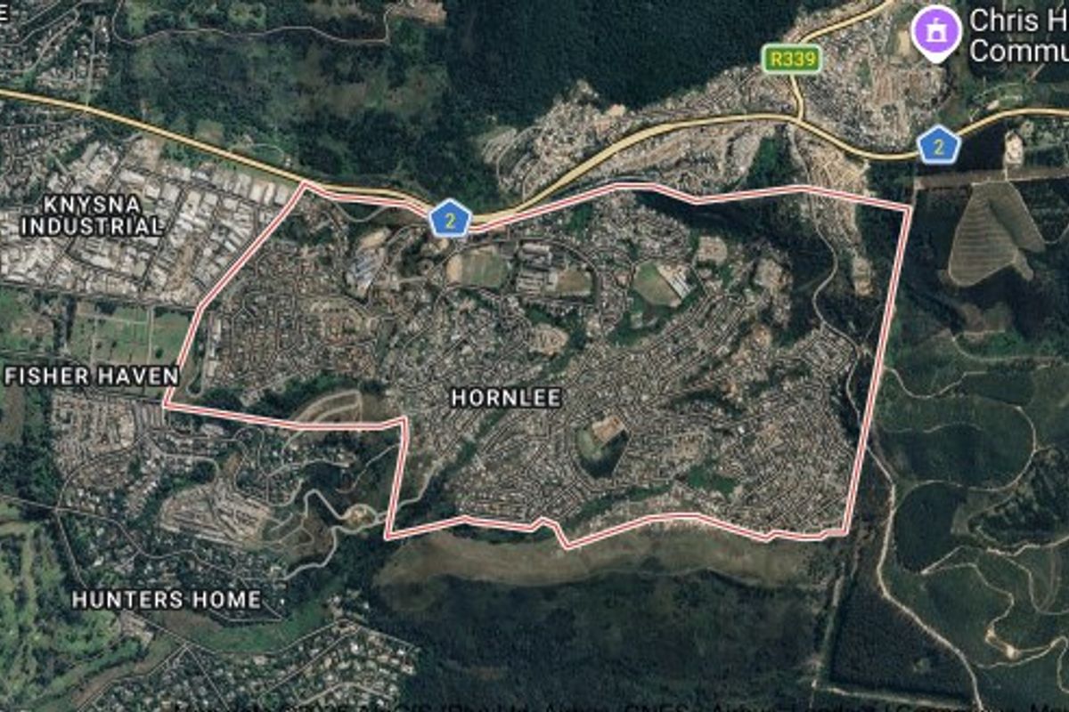 An aerial satellite view showing the Hornlee area in Knysna, including surrounding neighborhoods and major road infrastructure.