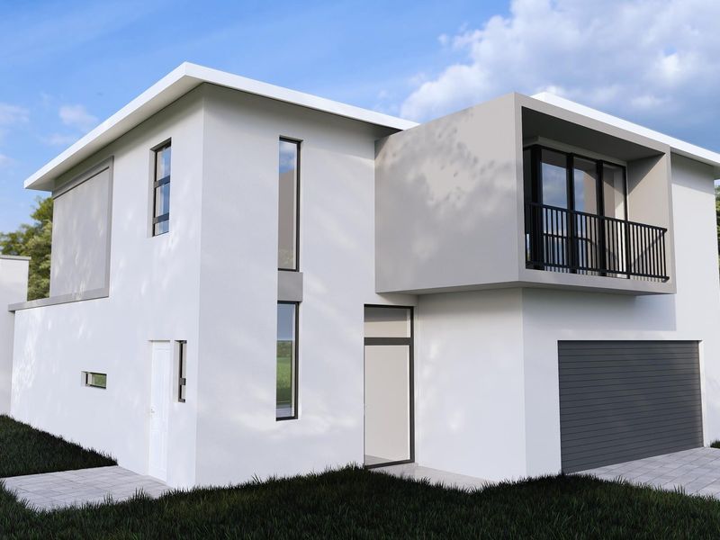 Modern two-story townhouse exterior featuring a sleek white facade, integrated garage, and a private upper-level balcony with metal railings.