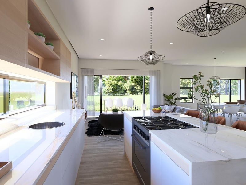 Modern open-plan kitchen and living area featuring a large stone island, gas cooktop, and seamless flow to the outdoor patio through sliding glass doors.