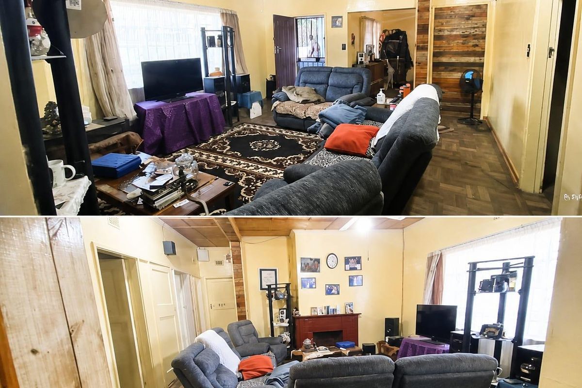 Living room featuring parquet flooring, timber ceiling paneling, and a ceiling fan. The space offers a traditional layout with potential for modernization.