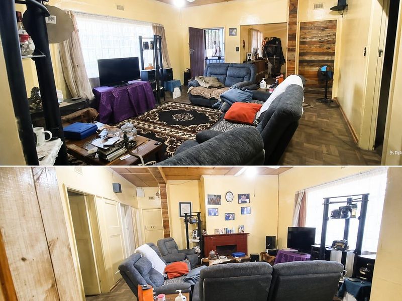 Living room featuring parquet flooring, timber ceiling paneling, and a ceiling fan. The space offers a traditional layout with potential for modernization.