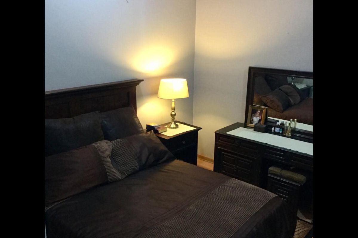 A bedroom featuring neutral wall finishes and standard flooring.