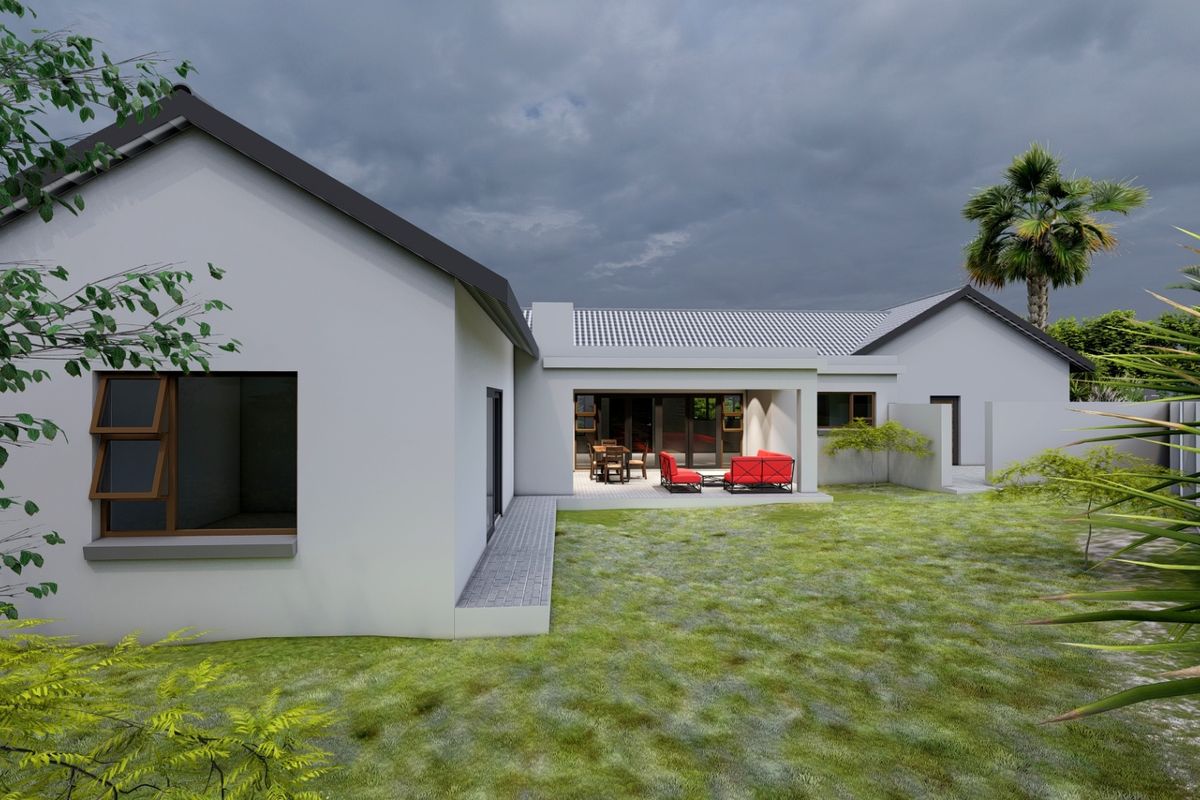 Rear view of a modern house featuring a covered patio, tiled roof, and landscaped garden area.