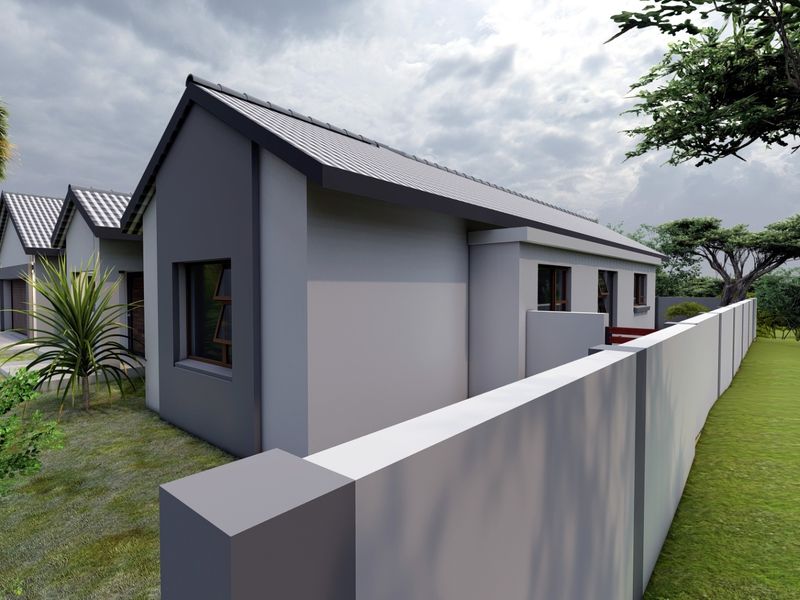 A modern residential exterior view featuring a clean grey facade, metal roofing, and a surrounding perimeter wall in a landscaped setting.