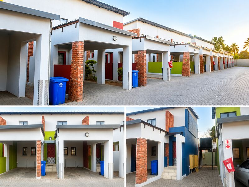 A row of apartment units featuring covered carports, brick pillar accents, and paved driveway access in a well-maintained residential complex.