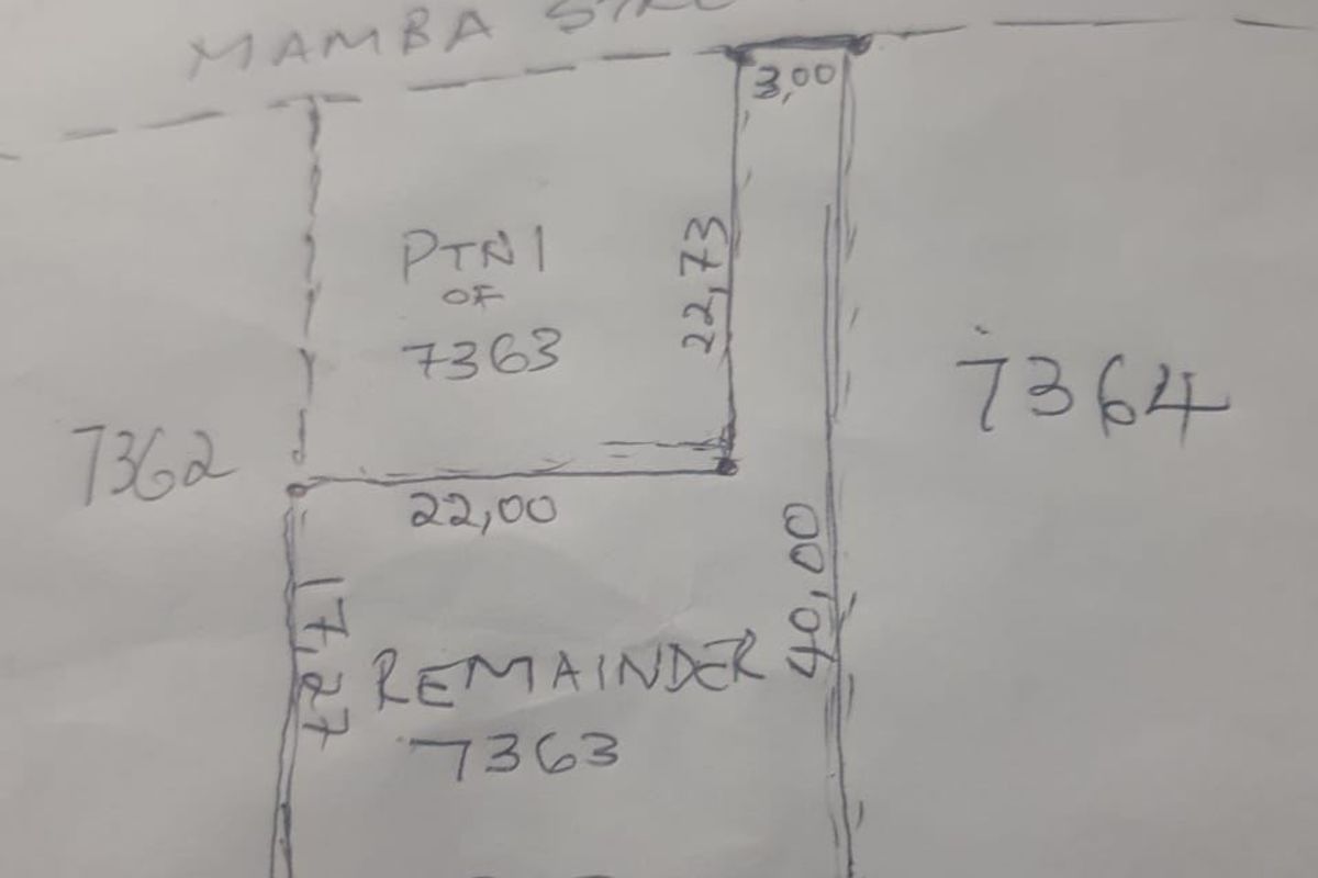A hand-drawn site plan showing the layout and dimensions of the residential land parcel.