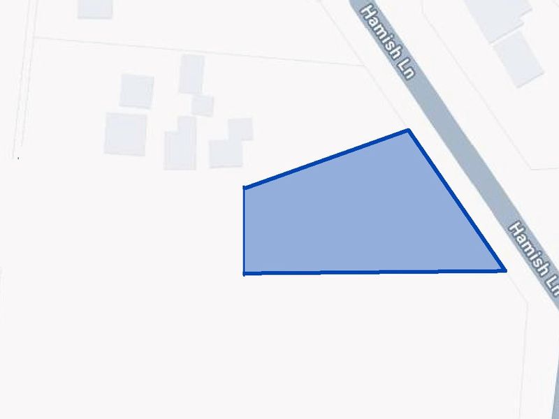 A map view highlighting the boundaries of the vacant residential land plot located along Hamish Lane.