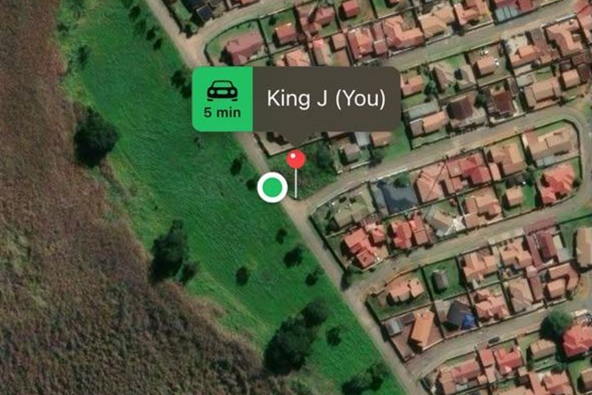 An aerial map view showing the location of the vacant residential land plot within a suburban neighborhood.