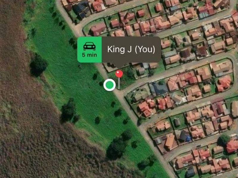 An aerial map view showing the location of the vacant residential land plot within a suburban neighborhood.