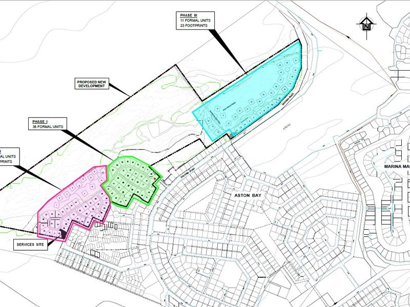 A detailed site development plan showing the layout of proposed residential phases, unit footprints, and service sites within the development area.