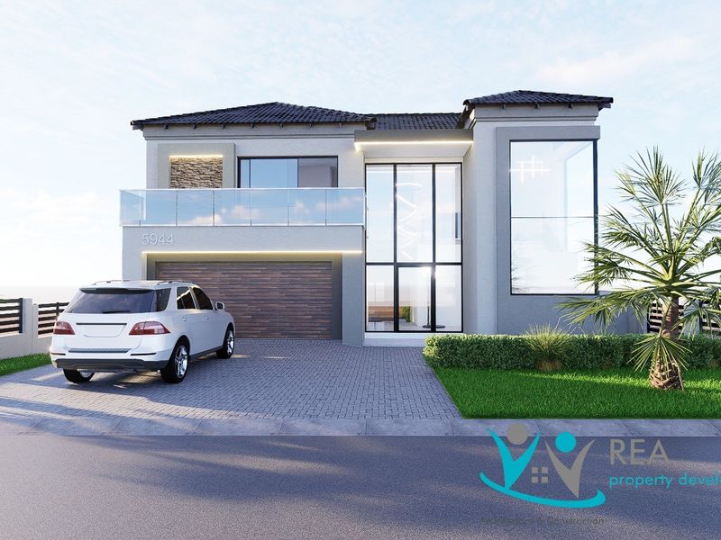 Modern double-story residential facade featuring a paved driveway, double garage, glass balcony, and contemporary architectural design elements.