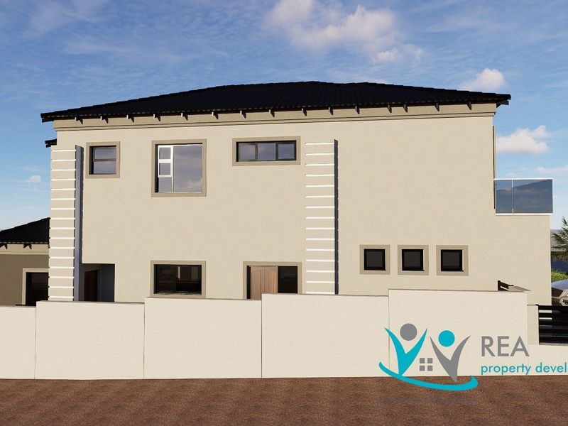 A modern double-storey residential exterior featuring a plastered facade, tiled roof, and secure boundary walling.