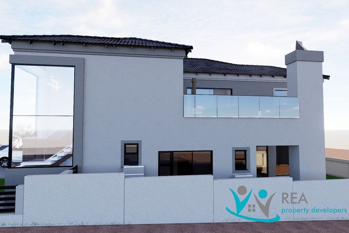 A modern architectural exterior view of the rear facade featuring a glass balcony, tiled roof, and large feature windows.
