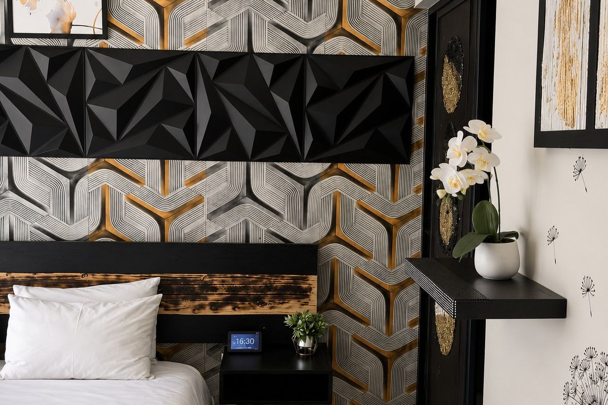 A modern bedroom featuring bold geometric wallpaper, a textured 3D accent wall panel, and a sleek floating bedside table.