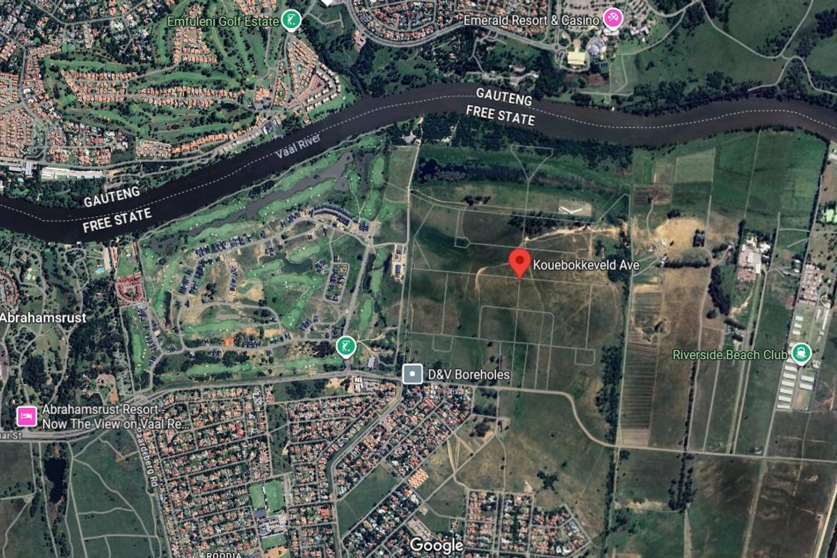 Aerial view of the residential land parcel located near the Vaal River, showcasing the surrounding landscape and proximity to local amenities.