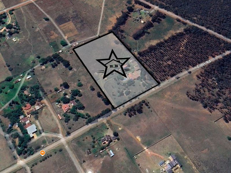 Aerial view of the property plot highlighting the location and surrounding landscape in a rural residential area.