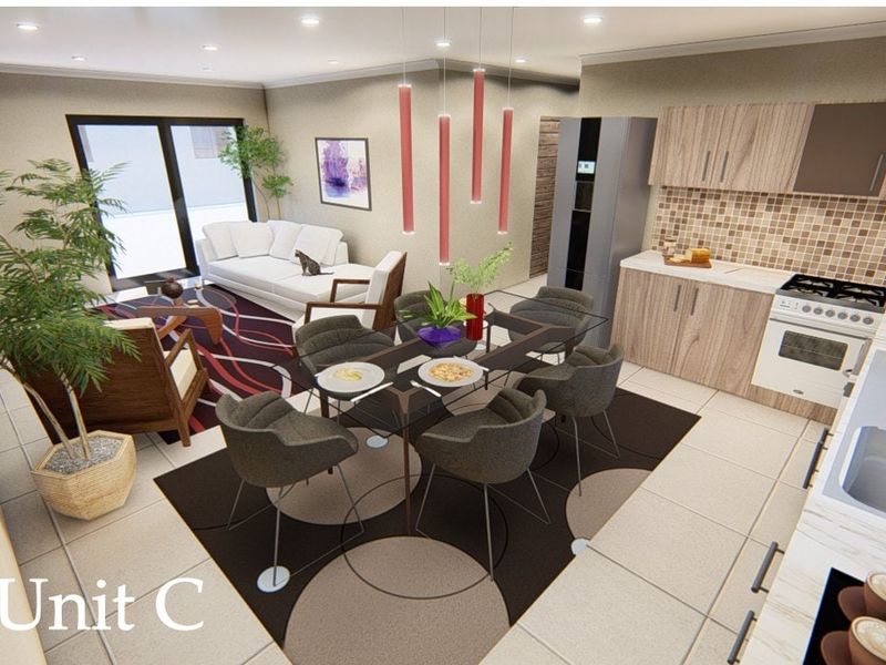 Modern open-plan living, dining, and kitchen area featuring tiled floors, contemporary cabinetry, and integrated appliances, creating a bright and functional living space.