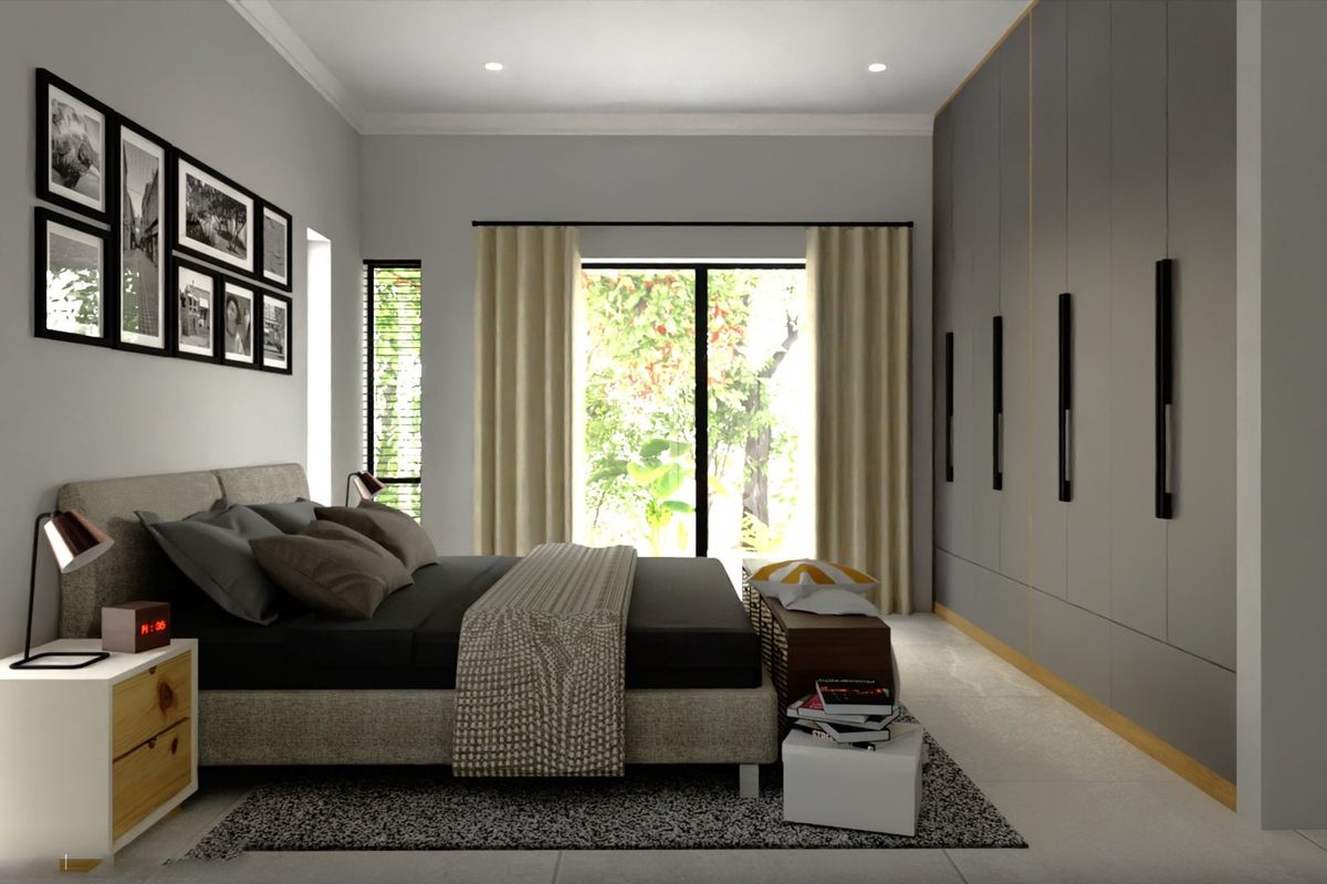 A modern bedroom featuring extensive floor-to-ceiling built-in cupboards, recessed lighting, and a sliding glass door providing natural light and garden views.