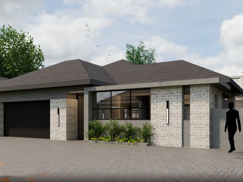 Modern townhouse exterior featuring a tiled roof, brick facade, paved driveway, and integrated garage, showcasing contemporary architectural design.