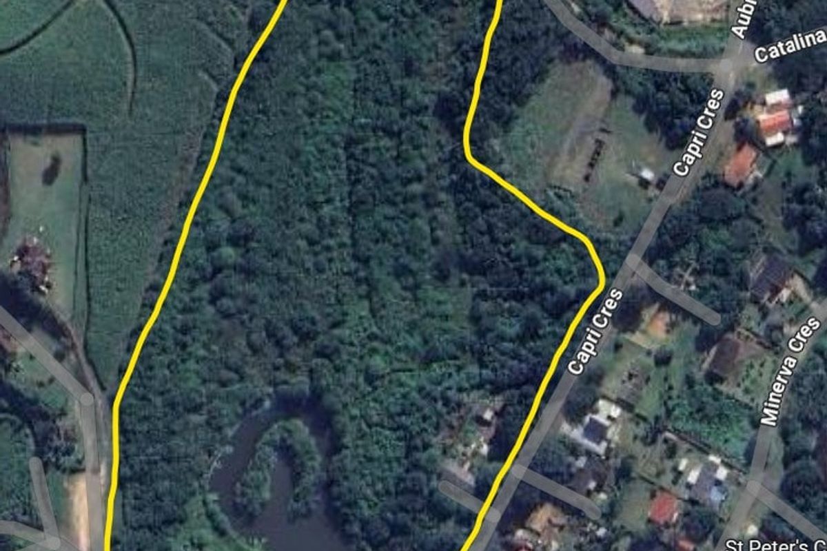 An aerial satellite view showing the property boundaries and surrounding residential neighborhood infrastructure.