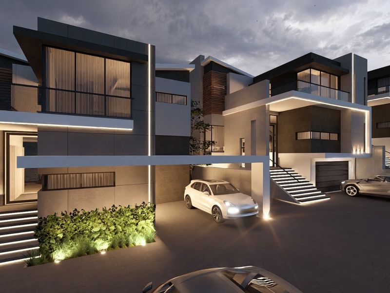 A modern architectural cluster home featuring a contemporary facade, integrated LED lighting, balconies, and a paved driveway with double garage access.