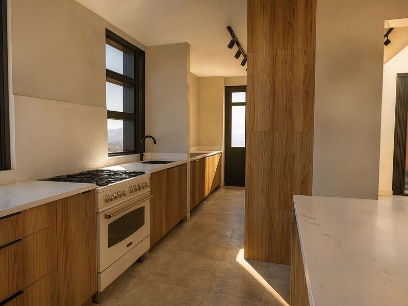 Modern kitchen featuring warm wood cabinetry, stone countertops, a gas stove, and a stylish herringbone backsplash with ample natural light.