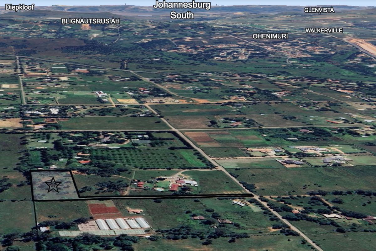 An aerial view showing the location of the vacant residential land plot within the surrounding rural and semi-rural landscape.