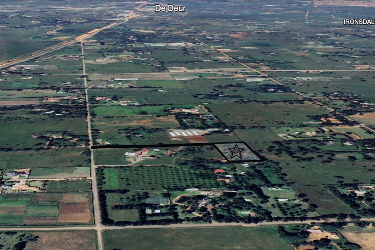 An aerial view of the residential vacant land plot, highlighting its location and surrounding landscape in the De Deur area.