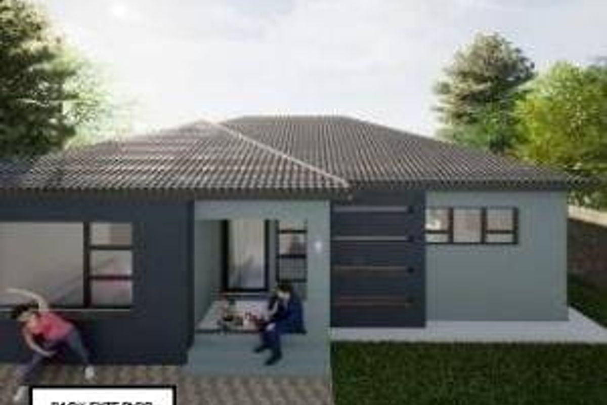 A rear exterior view of a modern single-story house featuring a tiled roof, paved patio area, and contemporary dark grey facade finishes.
