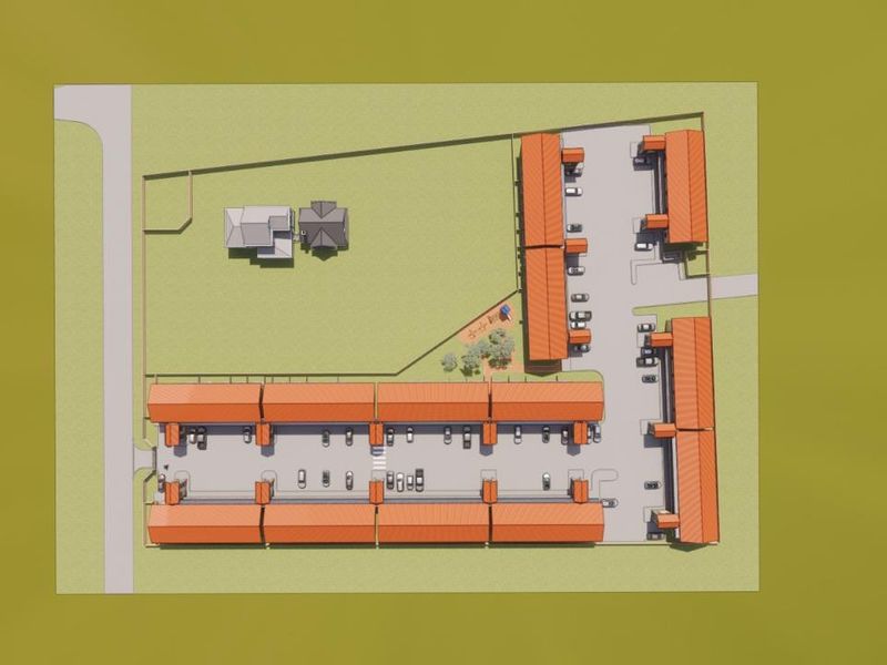 An aerial site plan showing the layout of the apartment complex, including building blocks, parking areas, and surrounding grounds.