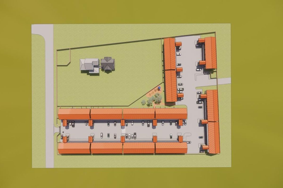 An aerial site plan showing the layout of the apartment complex, including building blocks, parking areas, and surrounding grounds.