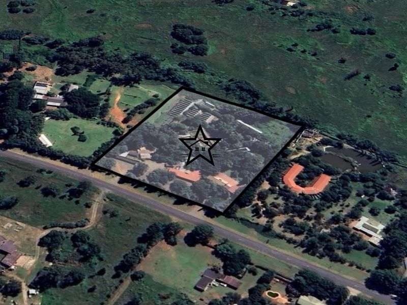 An aerial satellite view showing the property location and surrounding landscape.