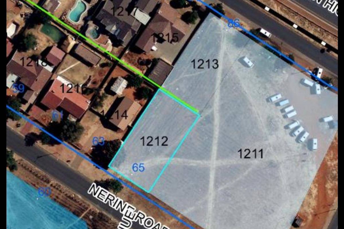 An aerial view showing the cadastral layout and boundaries of the vacant residential land plots in relation to surrounding infrastructure and roads.