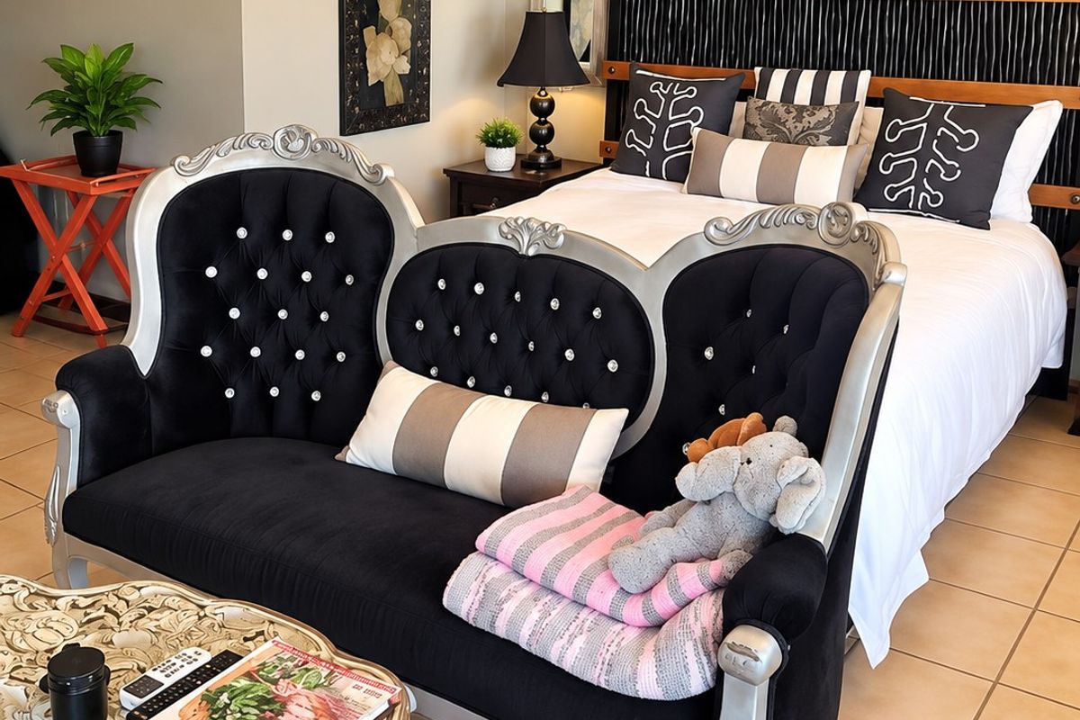 A well-maintained bedroom featuring tiled flooring, a split-system air conditioner, and a decorative built-in headboard.