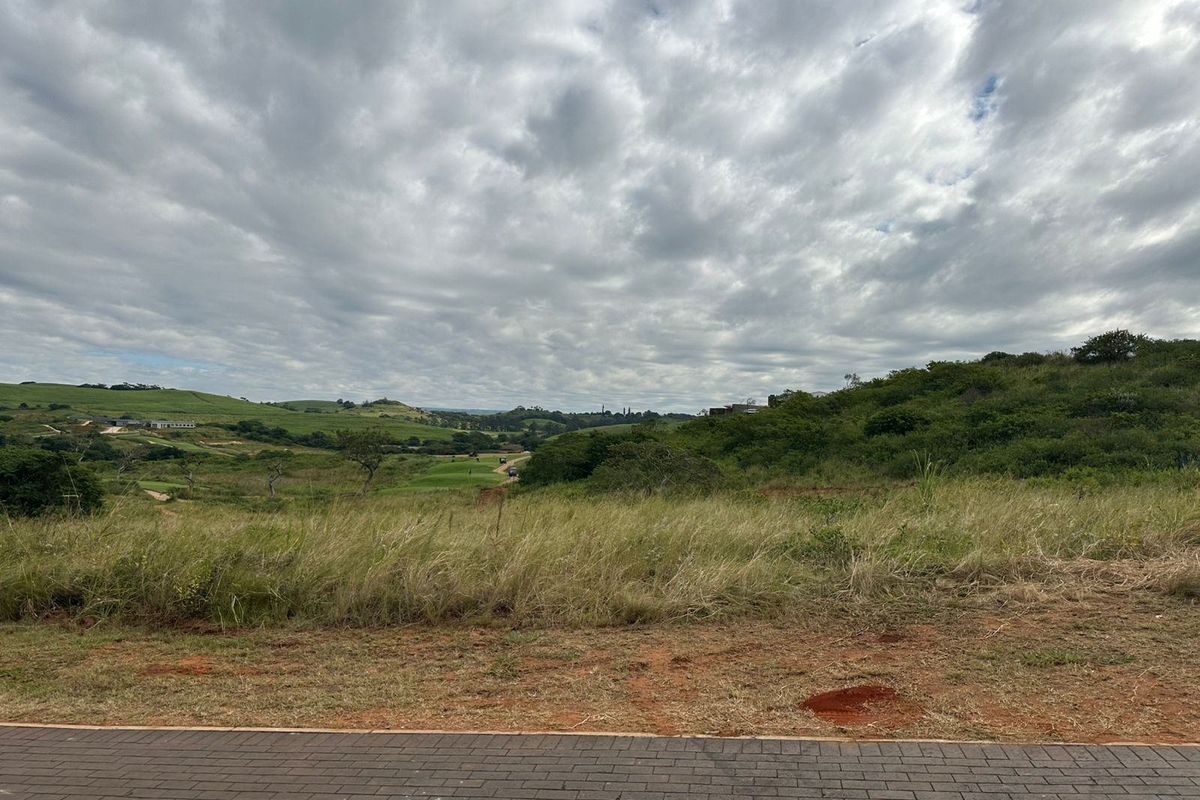 A scenic view of the vacant residential land, showcasing the natural landscape and surrounding estate terrain.