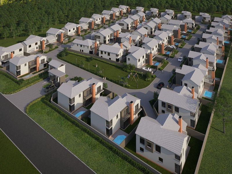 Aerial view of a modern residential estate featuring multiple detached houses, private pools, and landscaped communal grounds within a secure gated complex.