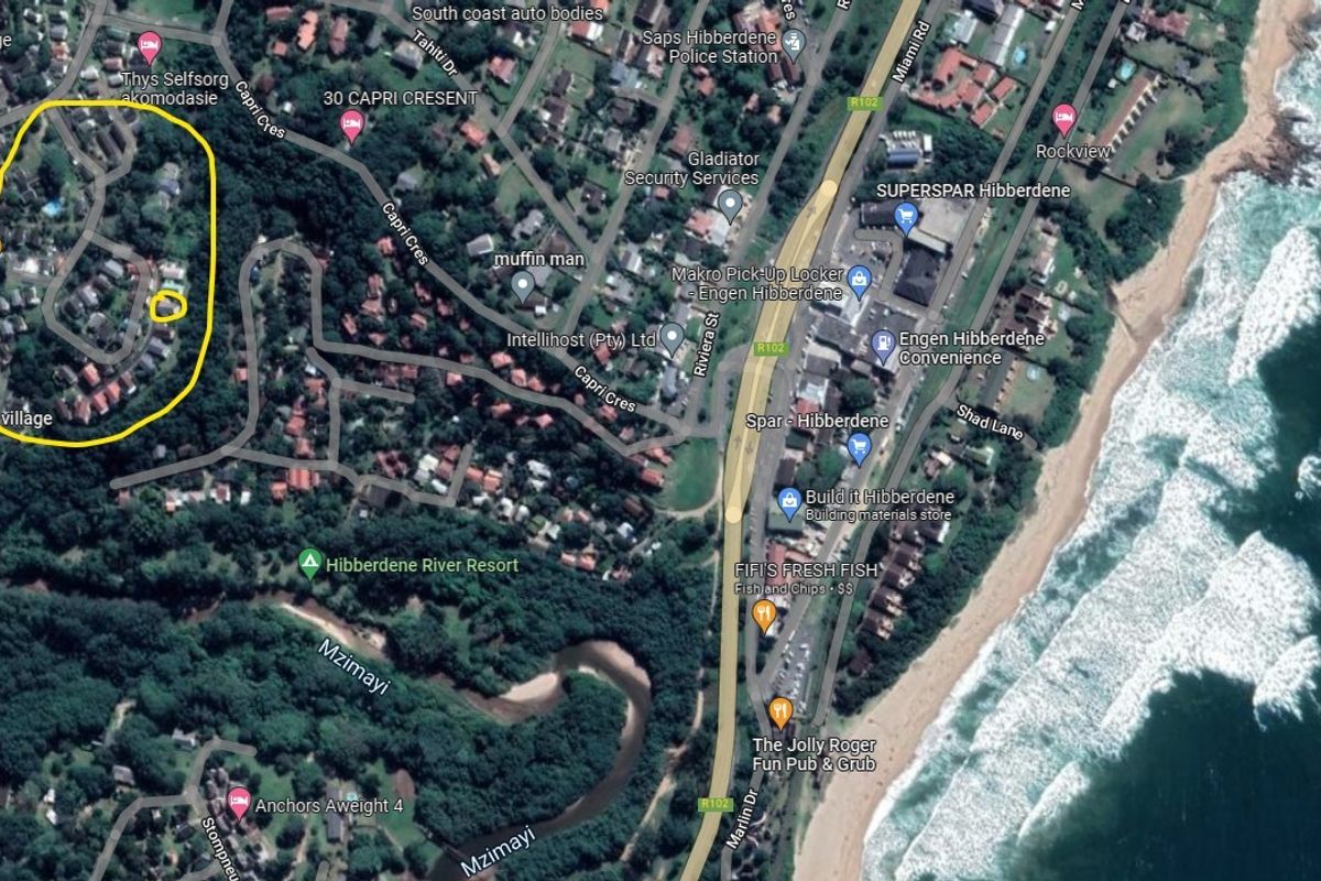 An aerial satellite view showing the property location in relation to the surrounding neighbourhood, local amenities, and the coastline.