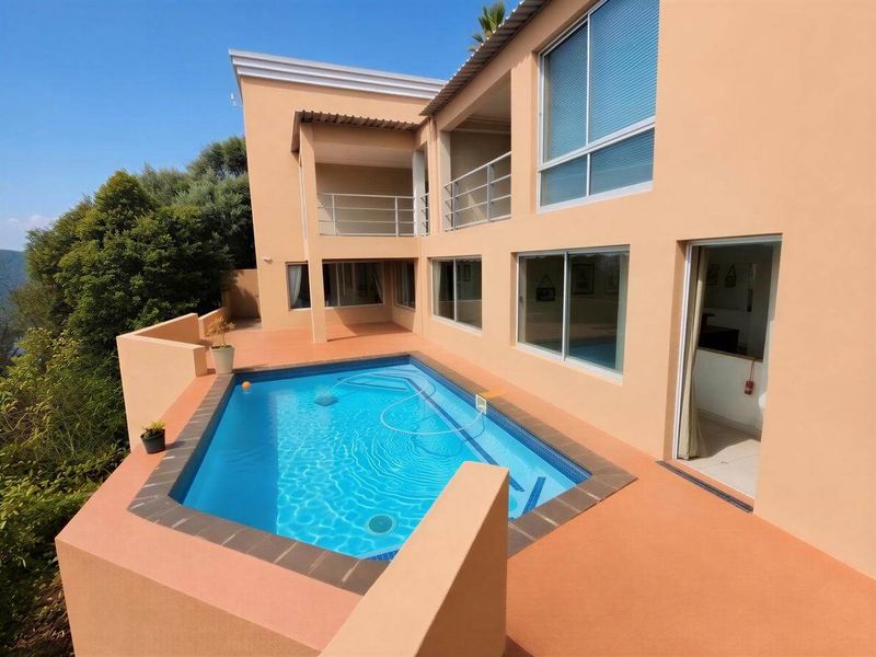 A multi-level exterior view featuring a swimming pool with a tiled surround, adjacent to a balcony and sliding glass doors leading into the home.