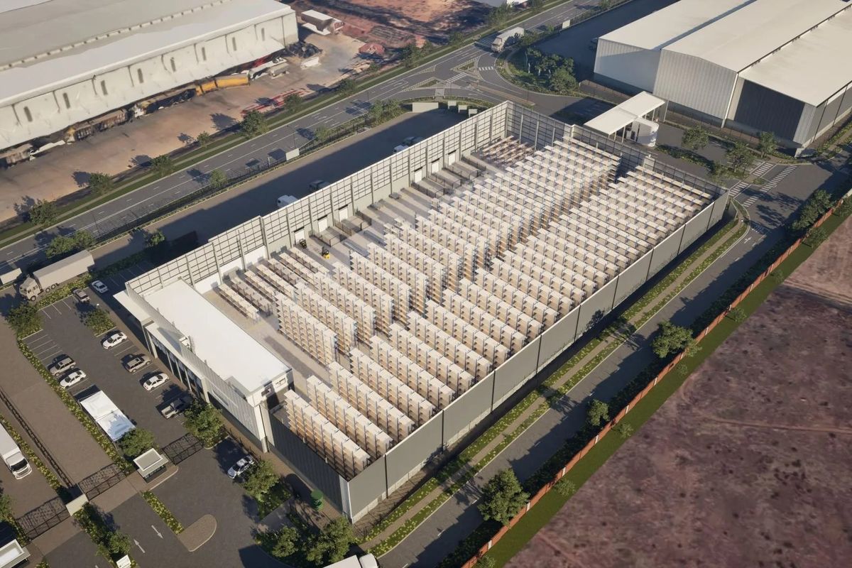 Aerial view of a large industrial warehouse facility featuring extensive storage racking, dedicated loading bays, and ample on-site parking.