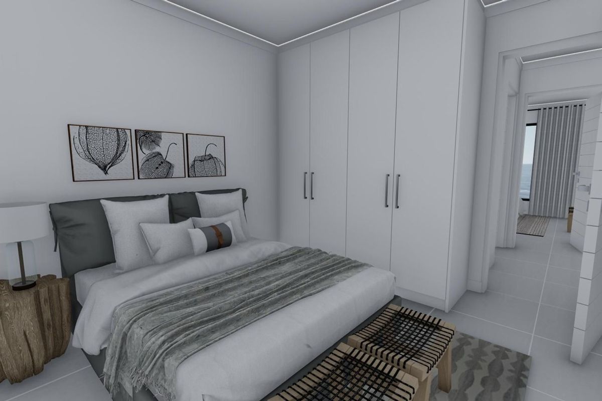 A modern bedroom featuring built-in floor-to-ceiling cupboards and recessed ceiling lighting, presented as a clean, contemporary interior space.
