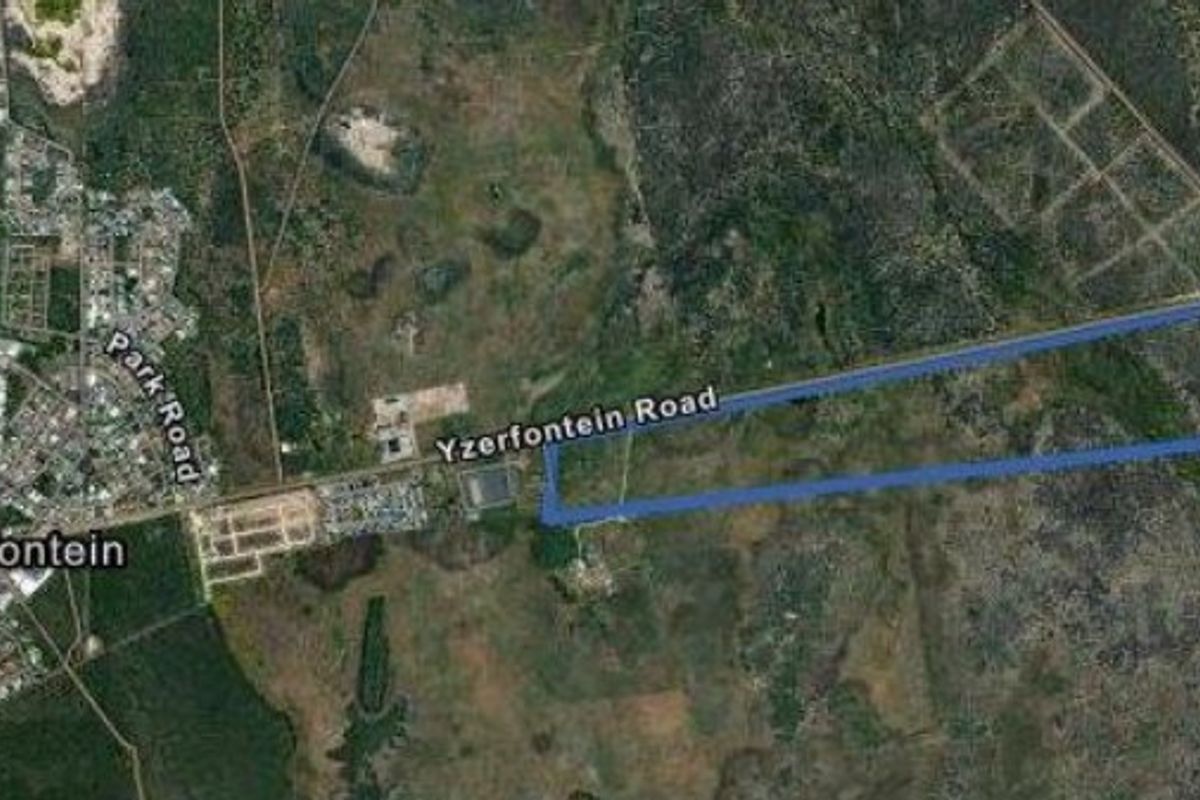 Aerial view of the vacant residential land parcel located near Yzerfontein Road, highlighting the property boundaries and surrounding landscape.