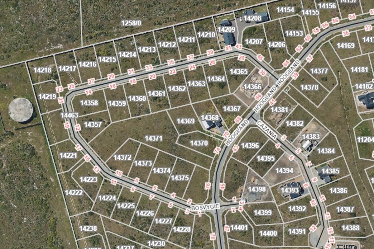 An aerial view showing the layout of residential vacant land plots and street infrastructure within the estate.