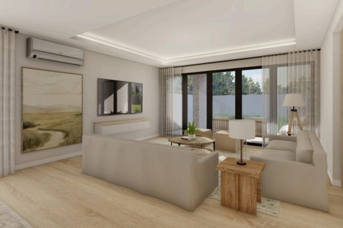 Modern living room featuring recessed ceiling lighting, light wood flooring, and large sliding glass doors leading to an outdoor area.