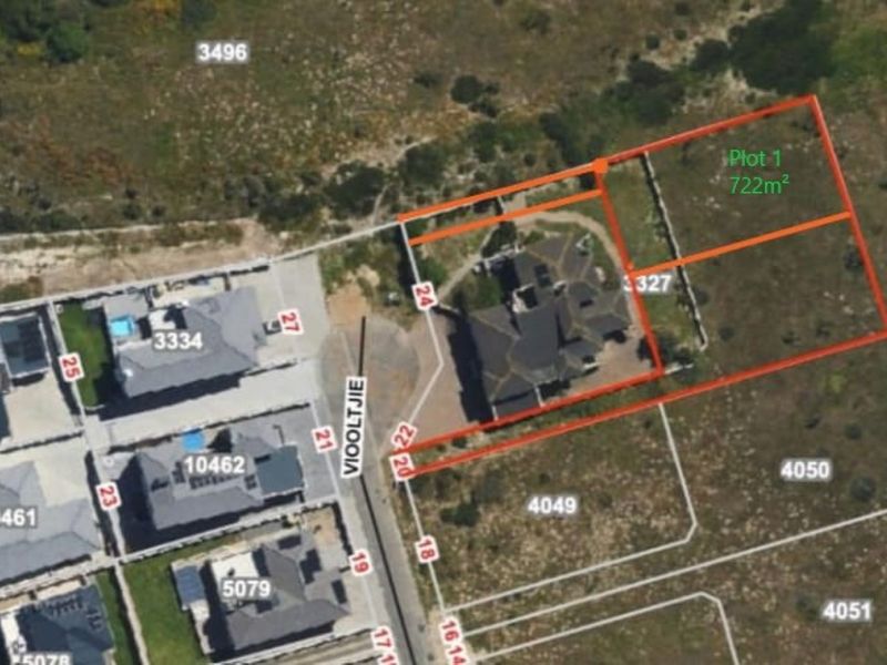 An aerial view showing the designated residential land plot with boundary lines and area measurement.