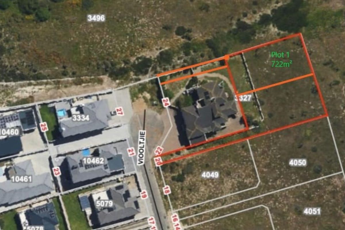 An aerial view showing the designated residential land plot with boundary lines and area measurement.
