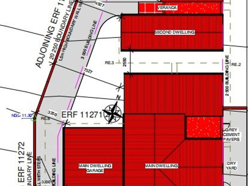 Architectural site plan showing the layout of the main dwelling, second dwelling, garages, and external paved areas on the property.