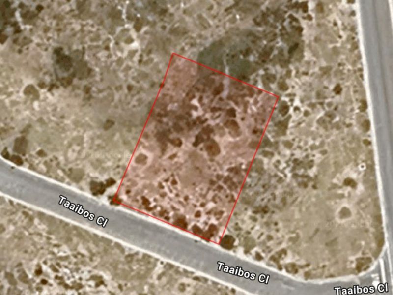 An aerial view showing the boundaries of a vacant residential plot located along Taaibos Close.