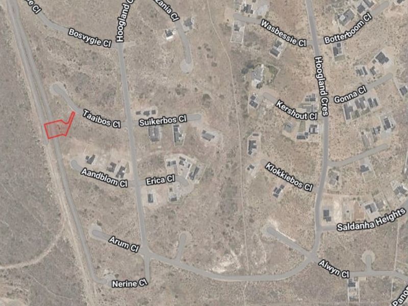 An aerial satellite view of the residential area showing the location of the vacant land plot highlighted in red.