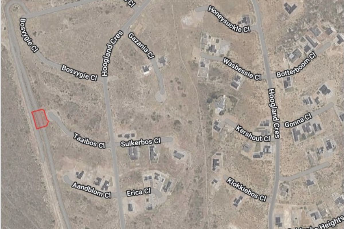 An aerial satellite view showing the residential land plot location within the surrounding street network and neighborhood layout.